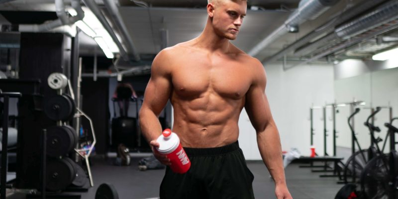 Shirtless Muscular Blonde Man at Gym