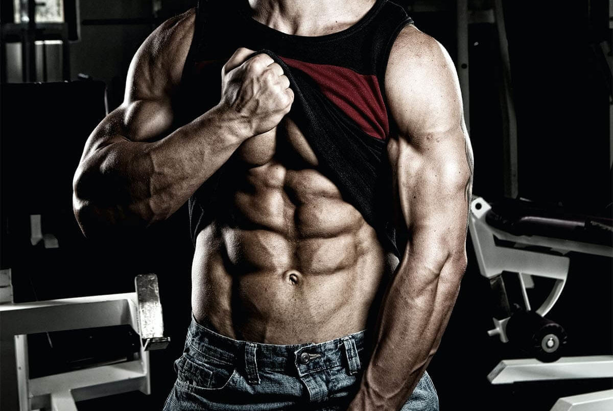 Man Lifting up Shirt To Show Abs and Pump
