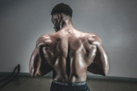 Bodybuilder Flexing Back Muscles